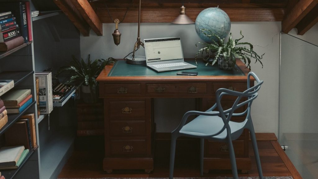 Desk with storage compartments, offering a practical workspace in a home office.